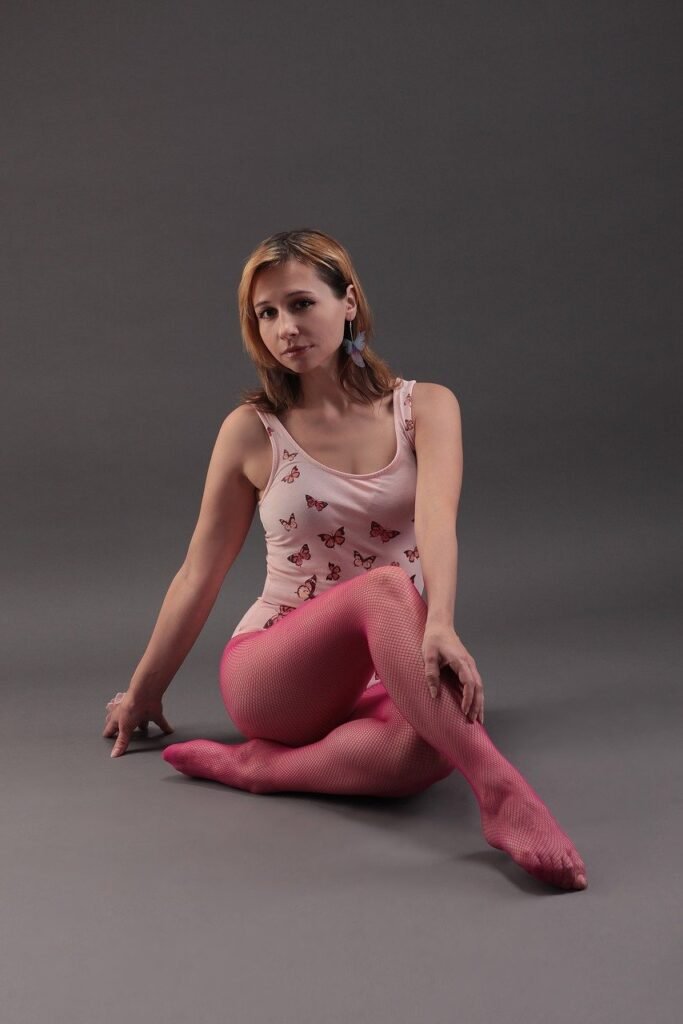 woman, young, sitting, tights, pattern, red.jpg